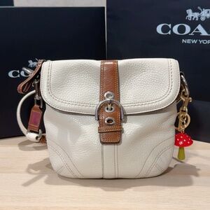 Vintage Coach Soho Pebble Leather Buckle Crossbody bag in Chalk/Brown Color